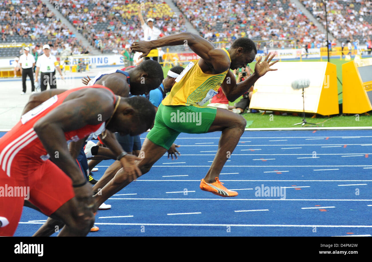 Jamaican Usain Bolt (R) makes a false start at the men?s 100m semi
