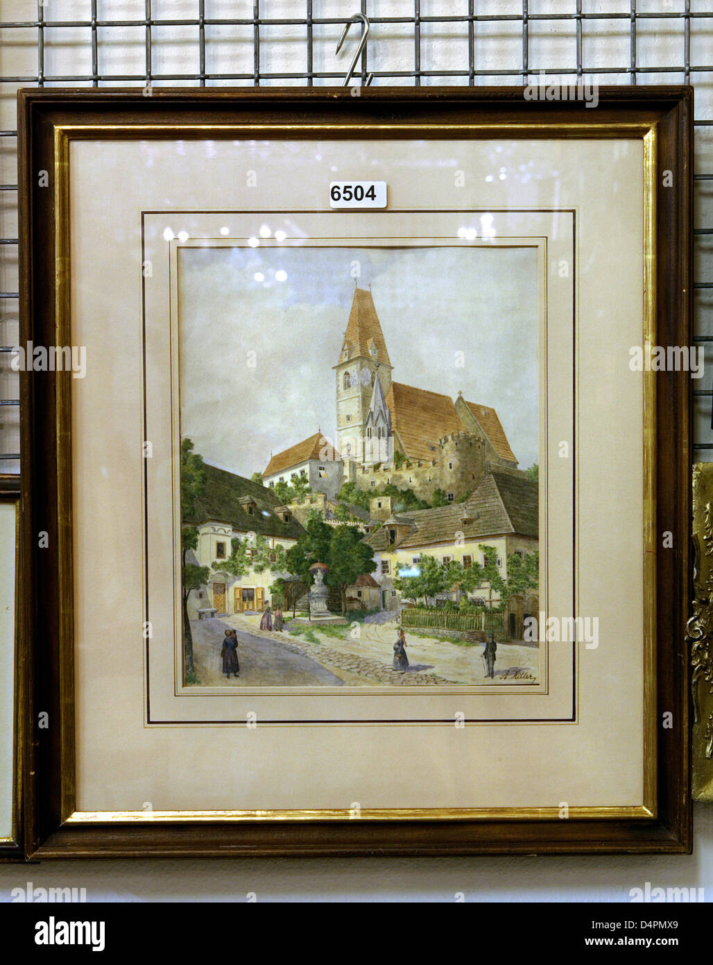 The watercolour ?Weissenkirchen in der Wachau? dated 1911 by Adolf Hitler at an auction house in Nuremberg, Germany, 19 August 2009. Apart from this work, two further watercolours by Hitler, ?Zerschossene Muehle? and ?Haus mit Bruecke am Fluss? dated 1910 will be auctioned at the beginning of September 2009. According to the auction house ?Weissenkirchen in der Wachau? had orginall Stock Photo