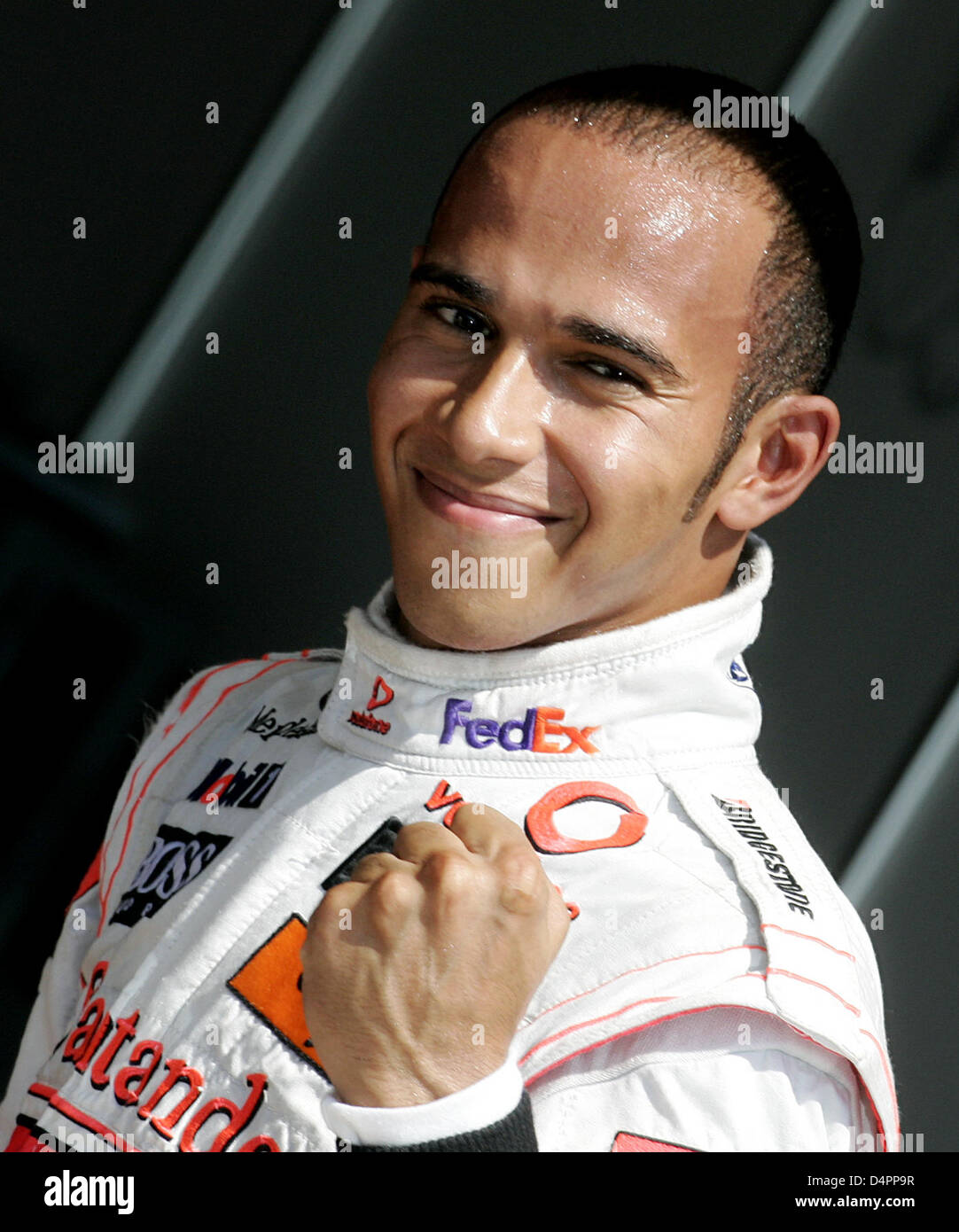 British Formula One driver Lewis Hamilton of McLaren Mercedes cheers after he claimed POle Position in the Qualifiying at Valencia Street Circuit in Valencia, Spain, 22 August 2009. The Formula 1 Grand Prix of Europe will take place on 23 August 2009. Photo: Felix Heyder Stock Photo