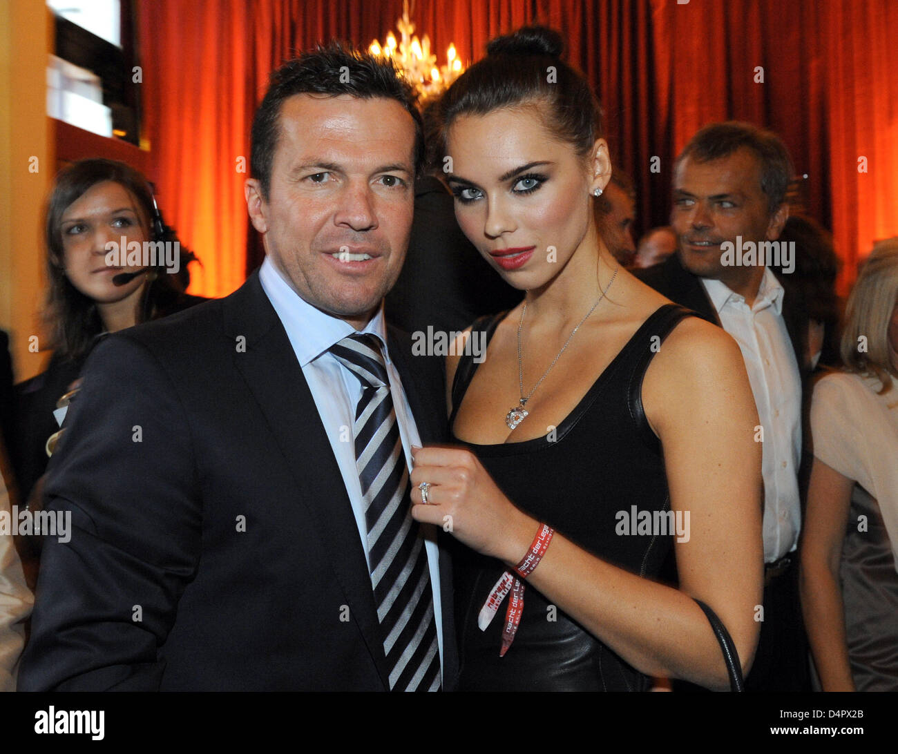German football legend Lothar Matthaus (L) and his wife Liliana (R) pose at the gala ?Day of Legends? in Hamburg, Germany, 06 September 2009. Former top football players played a charity match under the eyes of thousands of spectators. Photo: Marcus Brandt Stock Photo