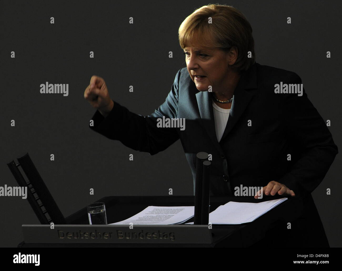 German Chancellor Angela Merkel adresses the German Bundestag on the state of the nation in a special session in Berlin, Germany, 08 September 2009. The special session?s agenda included also the topics of the Germany-ordered NATO airstrike in Afghanistan, passing the Lisbon Treaty comcomitant laws, the rehabilitaion of so-called ?war betrayers? and a debate on the state of the nat Stock Photo