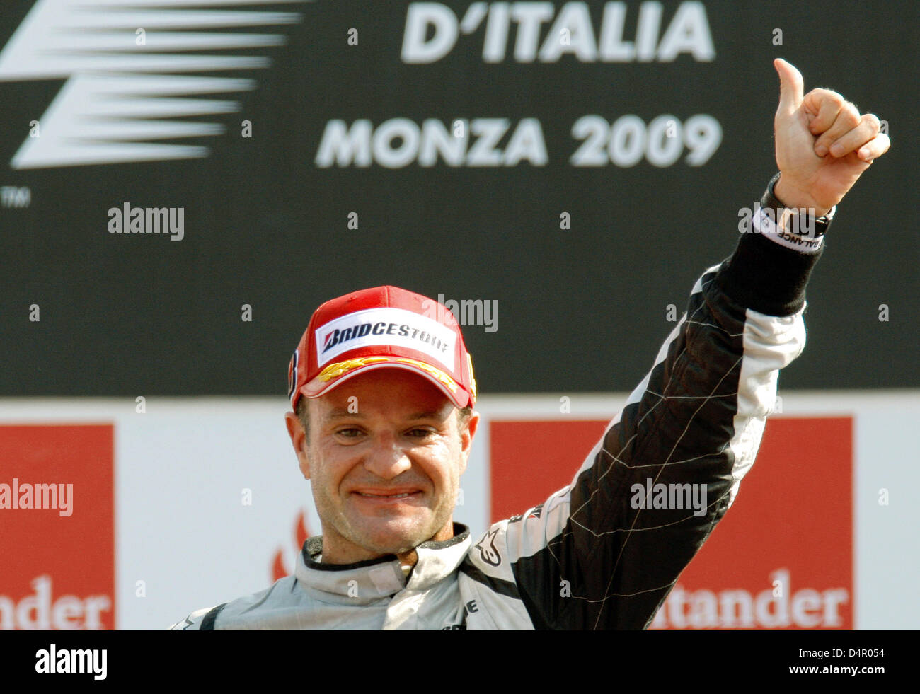 Brazilian Rubens Barrichello of Brawn GP celebrates on the podium after