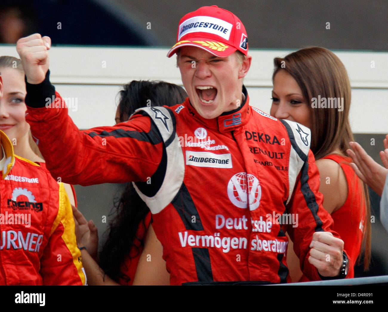 Gp2 Driver German GP2 driver Nico Huelkenberg celebrates finishing third in the ...