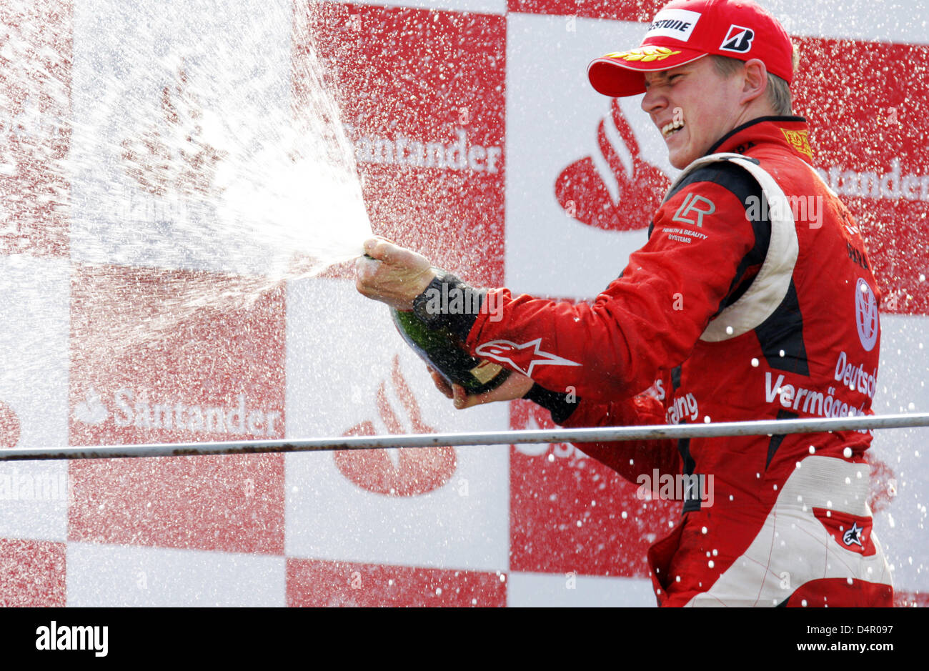 Gp2 Driver German GP2 driver Nico Huelkenberg celebrates finishing third in the ...