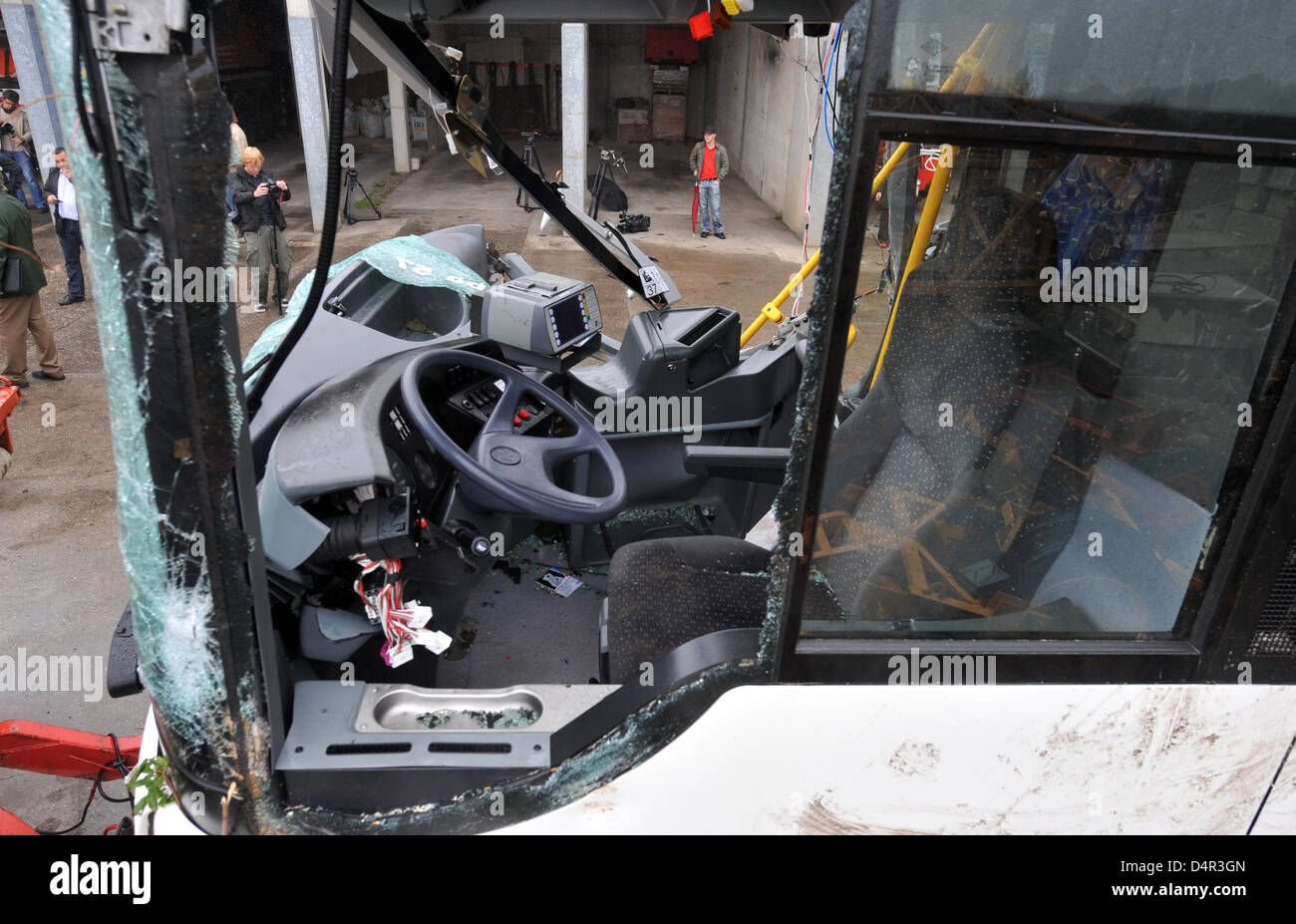 The wrecked bus stands on a yard in Radevormwald, Germany, 23 September 2009. Five persons died and seven more were injured when the regular bus fell down the side of the road into the bed of the Wupper river on 22 September. The reasons for the accident remain yet unclear, experts started to examine the bus. Photo: BERND THISSEN Stock Photo