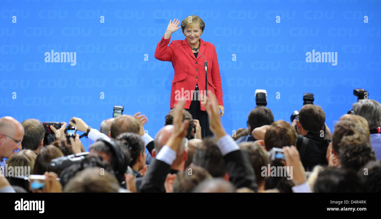 Angela Merkel German Chancellor and Chairwoman of Christian Democratic Union CDU cheers after the first federal elections projection during an election party at ?Konrad-Adenauer-Haus? in Berlin, Germany, September 2009. Photo: Peer Grimm Stock Photo