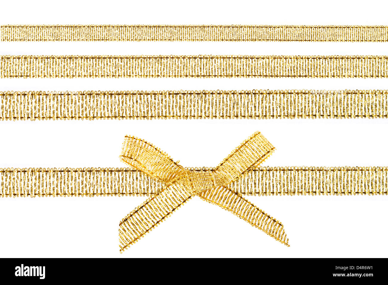 Beautiful gold bow and gold ribbons isolated on white background Stock