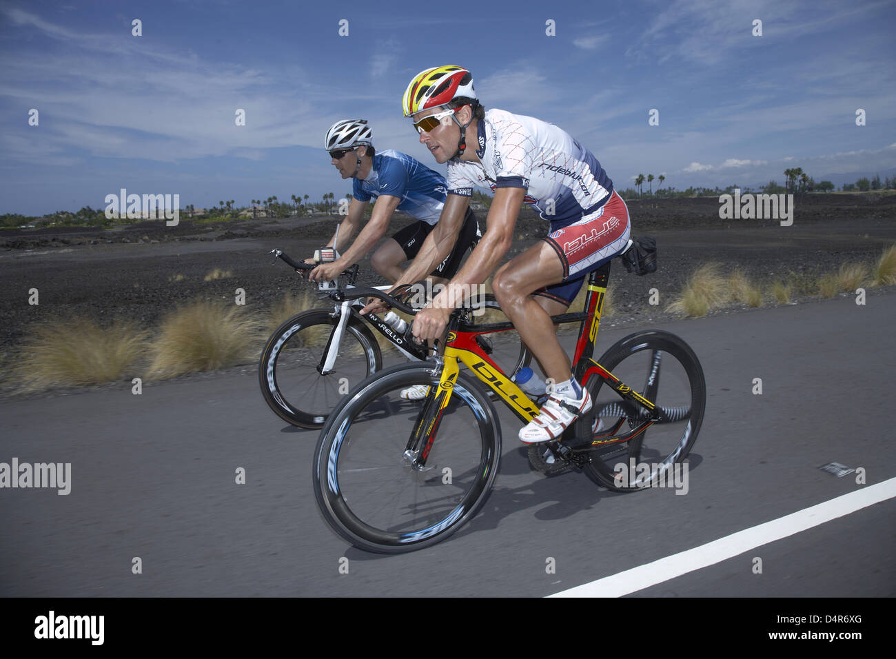 German triathlete Andreas Realert (R) prepares for the Ironman ...