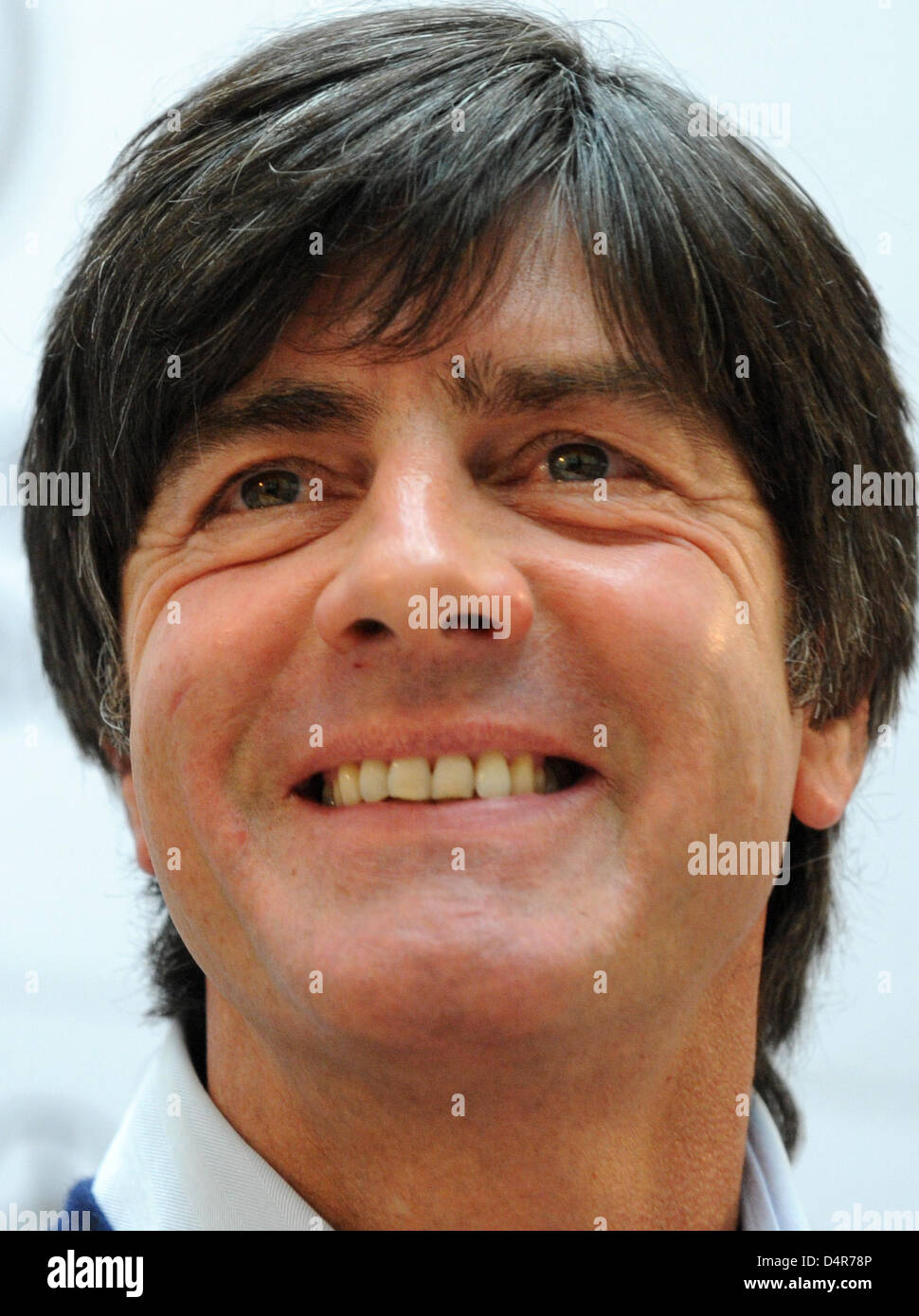 Germany head coach Joachim Loew smiles during a press conference of the German national team in Moscow, Russia, 09 October 2009. The German team faces Russia?s squad for a crucial FIFA 2010 World Cup qualifier on 10 October to be held on artificial turf at Luzhniki stadium of Moscow. Phhoto: Marcus Brandt Stock Photo