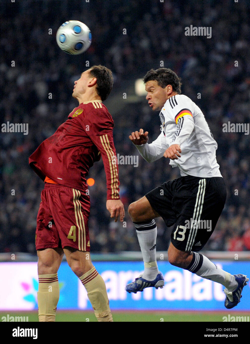 Germany?s Michael Ballack (R) vies for the ball with Russia?s  Sergei Ignashevich during the World Cup 2010, Group 4 qualifier Russia vs Germany at Luzhniki Stadium in Moscow, Russia, 10 October 2009. Germany won 1-0. Photo: Marcus Brandt Stock Photo