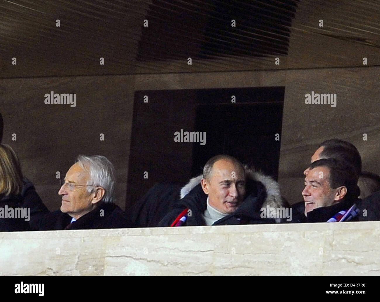 Russian Prime Minister Vladimir Putin (C), Russian President Dmitry Medvedev (R) and former Bavarian Prime Minister Edmund Stoiber (L) watch the World Cup 2010, Group 4 qualifier Russia vs Germany at Luzhniki Stadium in Moscow, Russia, 10 October 2009. Germany won 1-0. Photo: Achim Scheidemann Stock Photo