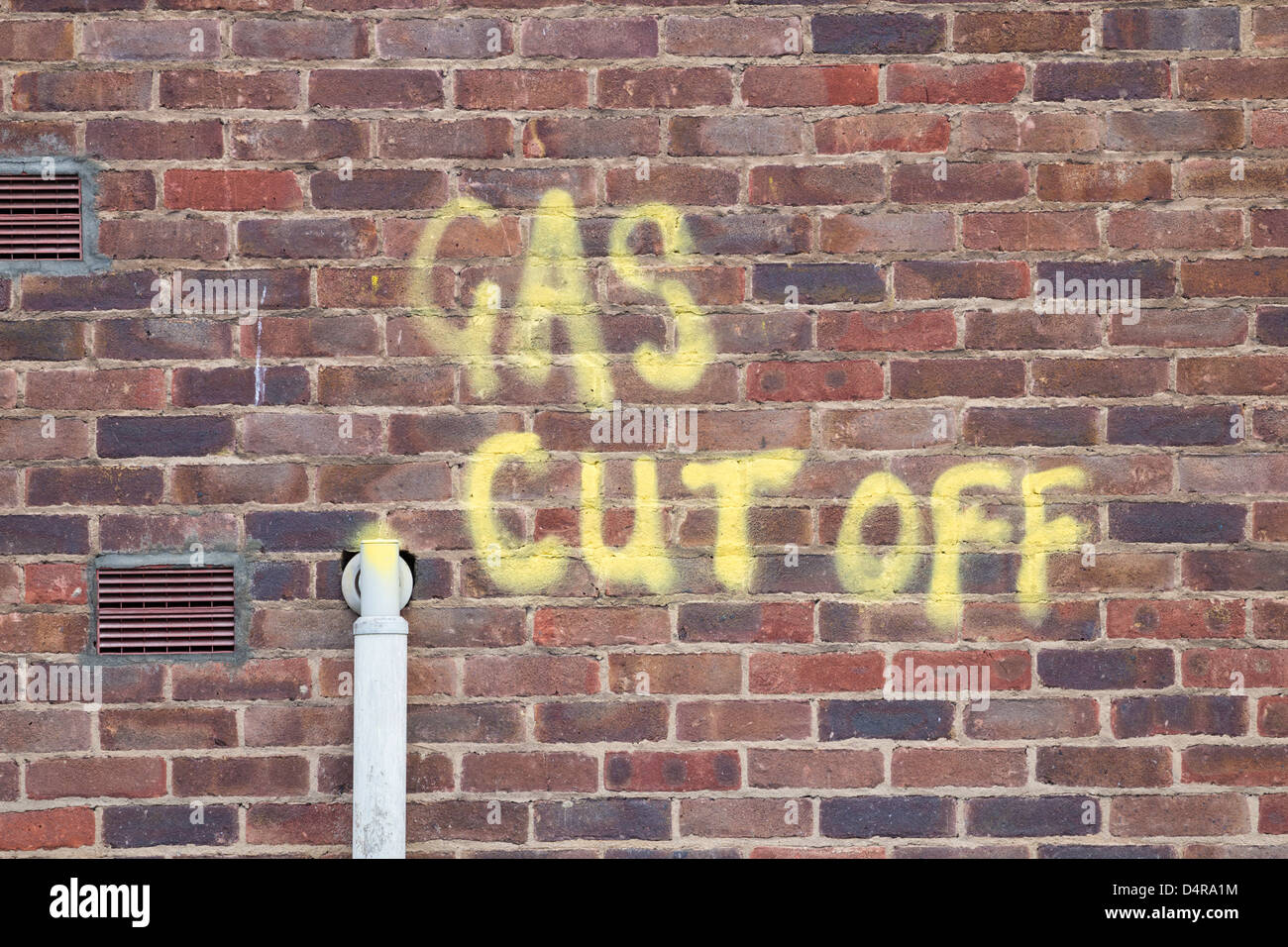 Gas cut off painted on building wall near pipe Stock Photo Alamy