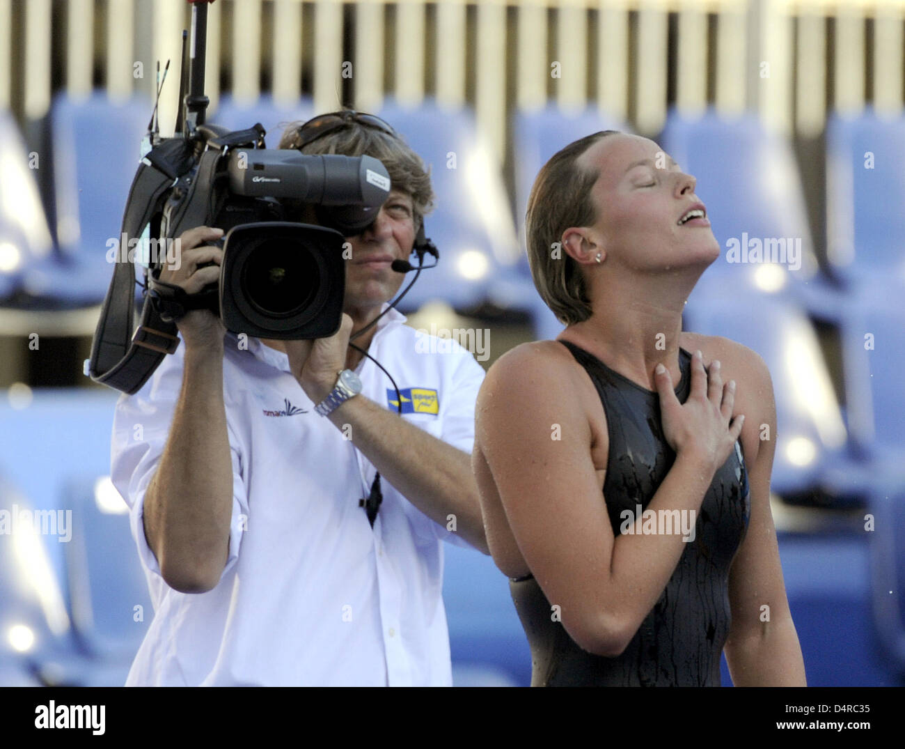Italian swimmer Federica Pellegrini celebrates her victory in final of