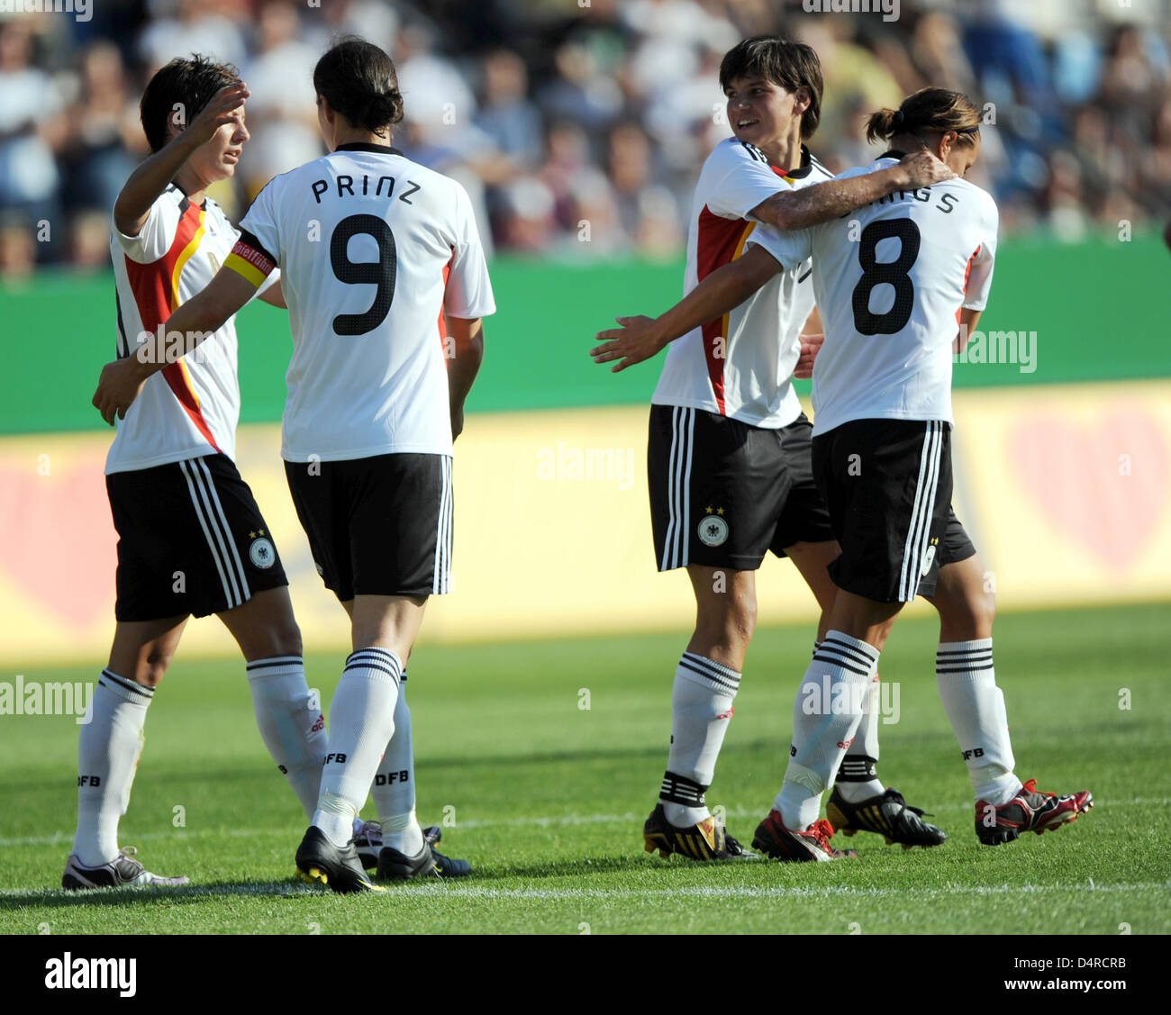 Germans Linda Bresonik (LR), Birgit Prinz, Ariane Hingst and Inka