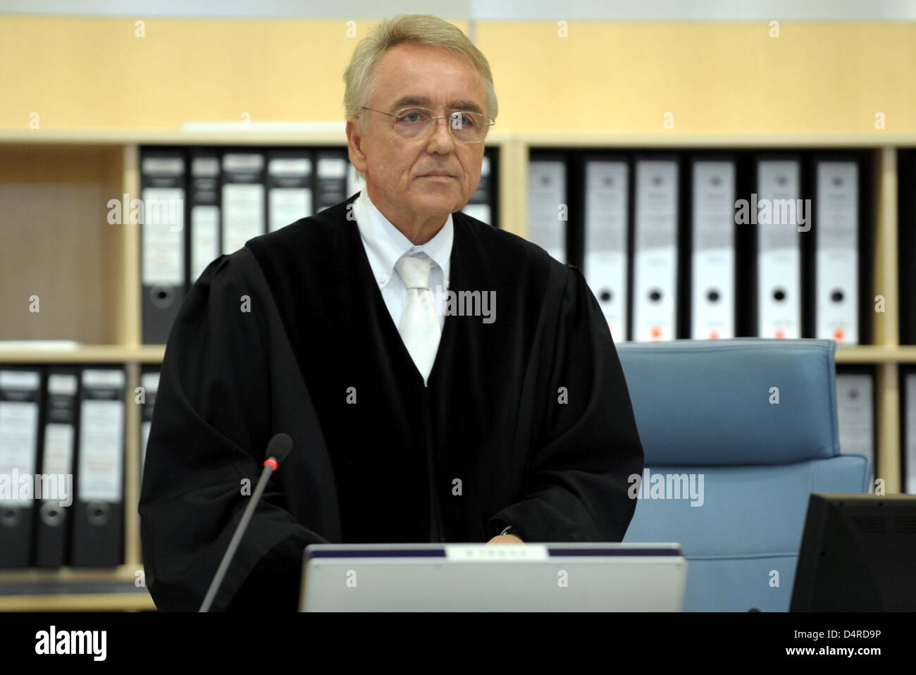 Chief judge Ottmar Breidling stands in the court room at the Higher Regional Court in Duesseldorf, Germany, 10 August 2009. The defendants in the terror trial against the so-called ?Sauerland group? kept their word and started making broad confessions. The four men already had more than 1000 pages of confessions recorded in custody in the last few weeks. Photo: FEDERICO GAMBARINI Stock Photo