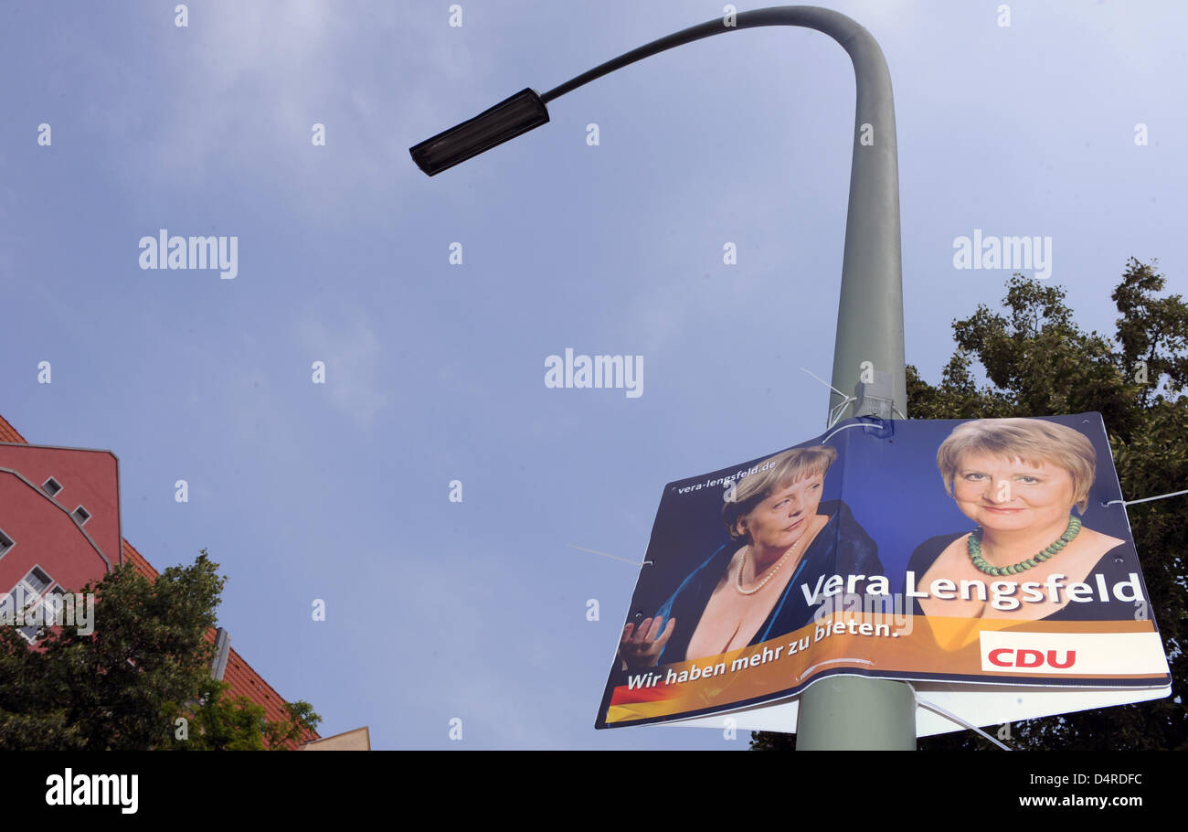 An election poster reading ?We have more to offer? displays Vera Lengsfeld  (R), direct canddidate for Berlin?s Christian Democrats (CDU), and German  Chancellor Angela Merkel (L), CDU top candidate for the federal