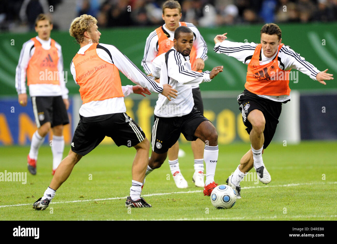Simon Rolfes (front, L-R), Cacau and Christian Gentner of Germany?s ...