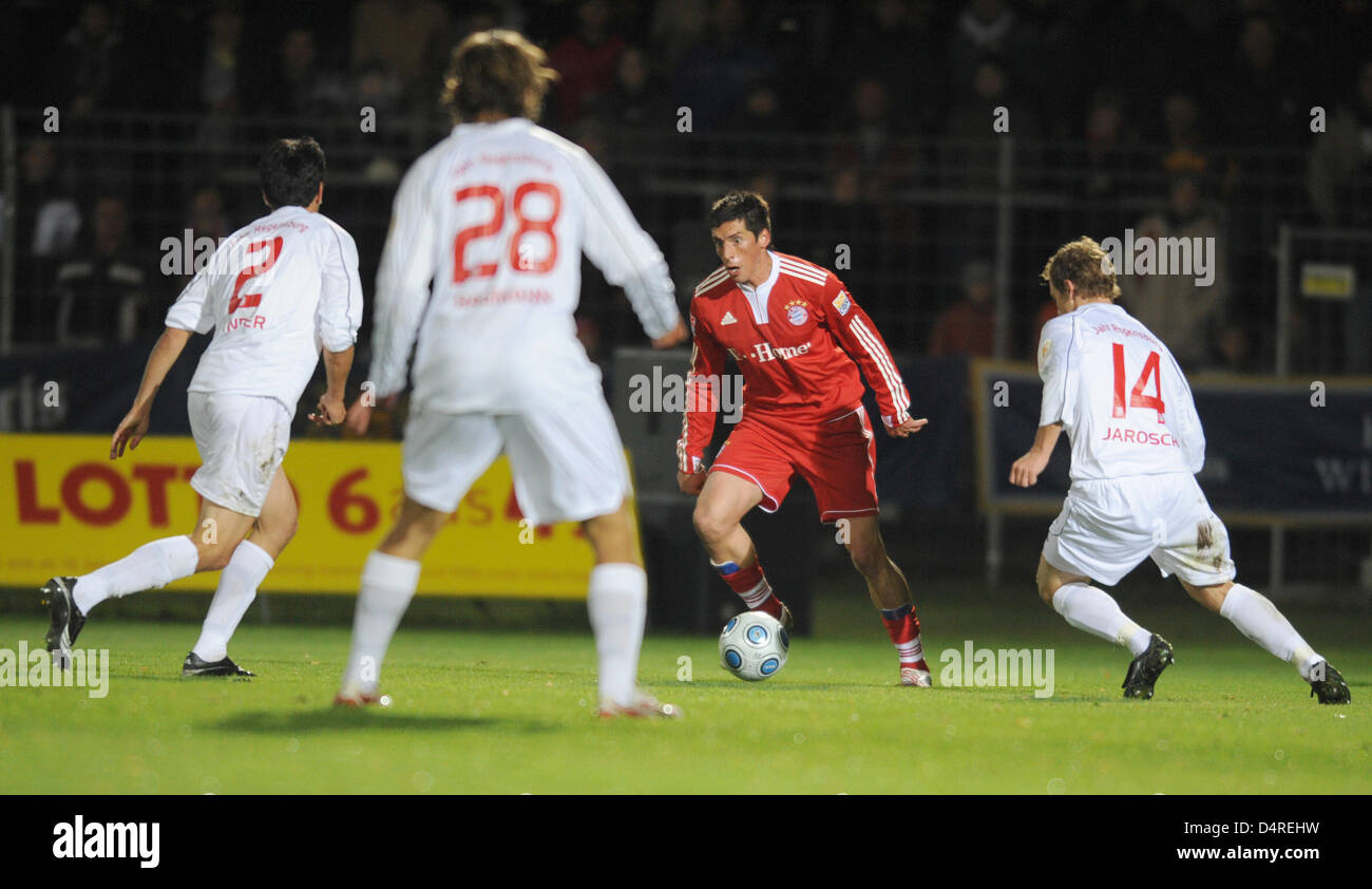 BUDAPEST, HUNGARY - MARCH 2: (r-l) David Markvart of DVTK controls the ball  next to Roland Varga of Ferencvarosi TC during the Hungarian OTP Bank Liga  match between Ferencvarosi TC and DVTK