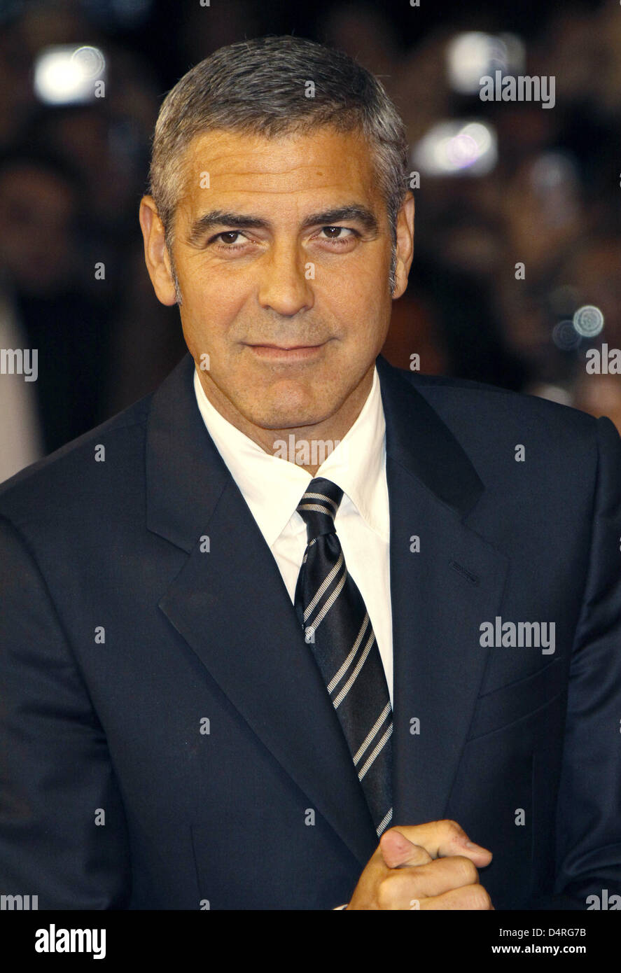 US actor George Clooney arrives for the premiere of the film ?Up In The ...