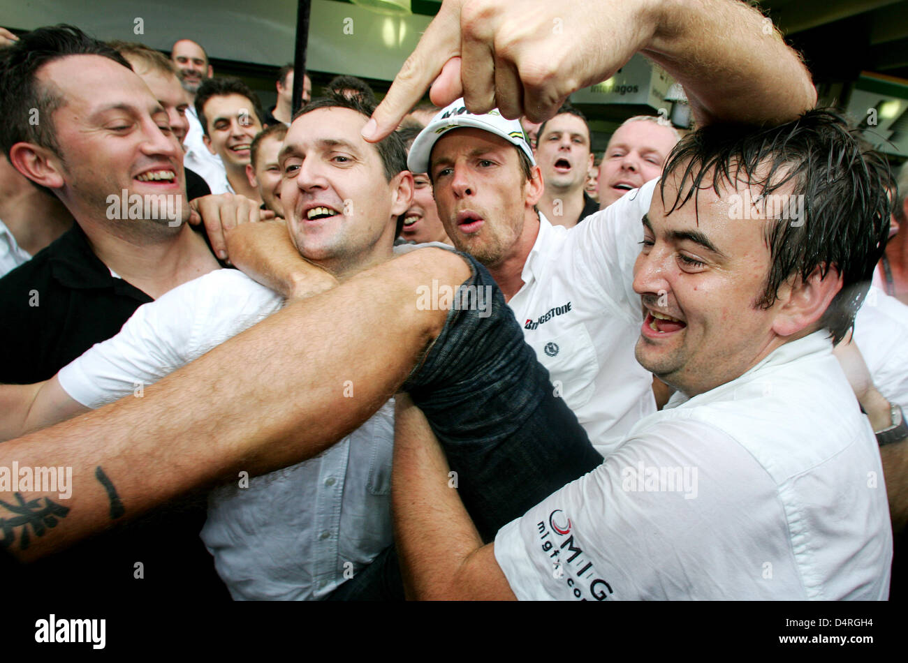 The New World Champion British Formula One driver Jenson Button of Brawn GP shows his tattoo after the Formula 1 Grand Prix of Brazil at Jose Carlos Pace race track in Interlagos near Sao Paulo, Brazil, 18 October 2009. Photo: Felix Heyder Stock Photo