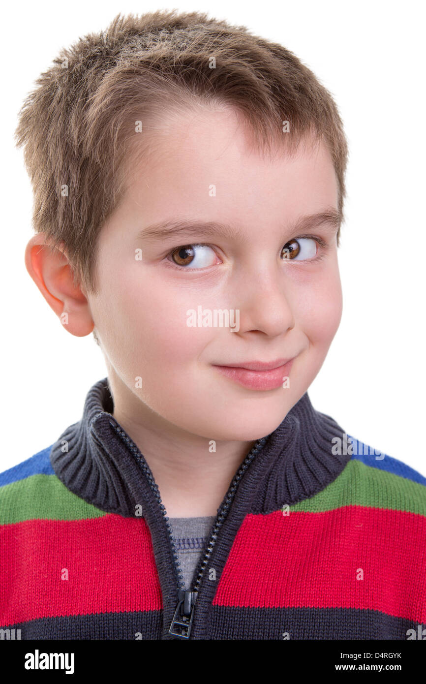 Kid giving a mischievous side look. Wonder what he thinks. Stock Photo