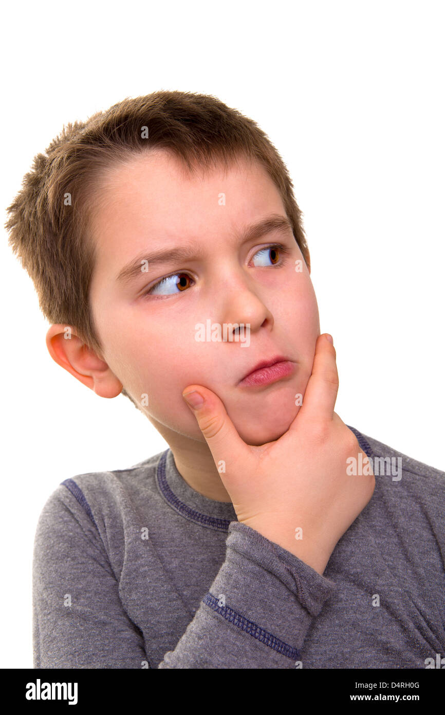 Whats going on? Kid giving a suspicious look. Wonder what he thinks. Stock Photo