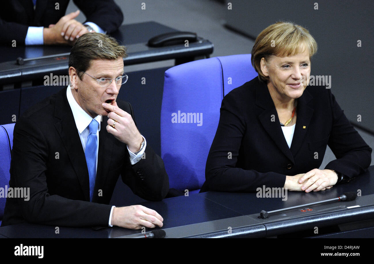 Reelected German Chancellor Angela Merkel and German Foreign Minister Guido Westerwelle sit next to each other at the Bundestag in Berlin, Germany, 28 October 2008. Both took their official oaths in front of Parliament on the same day. Photo: Robert Schlesinger Stock Photo
