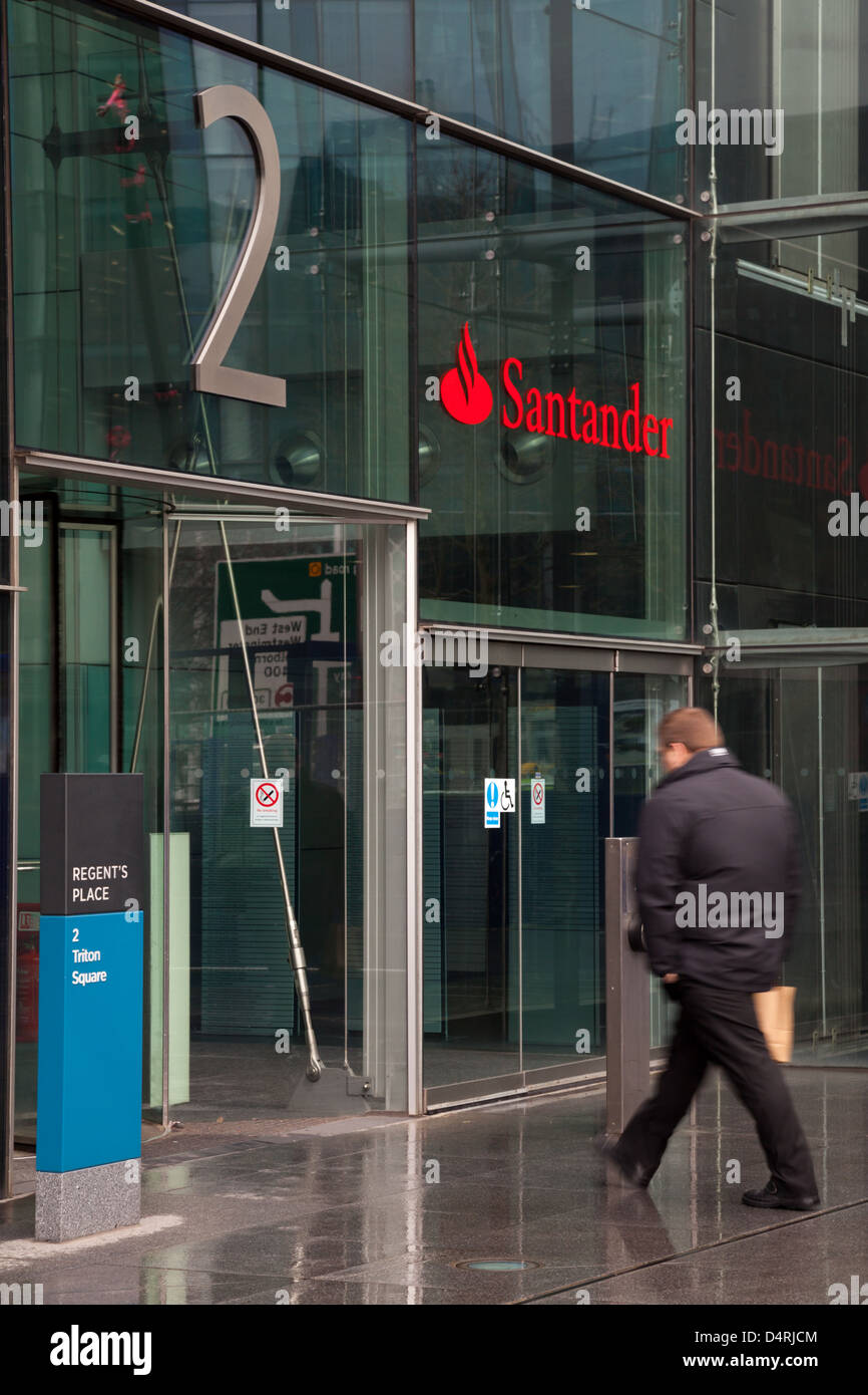 A man walking into the Santander UK Head Office at Regent's Place, London. Stock Photo