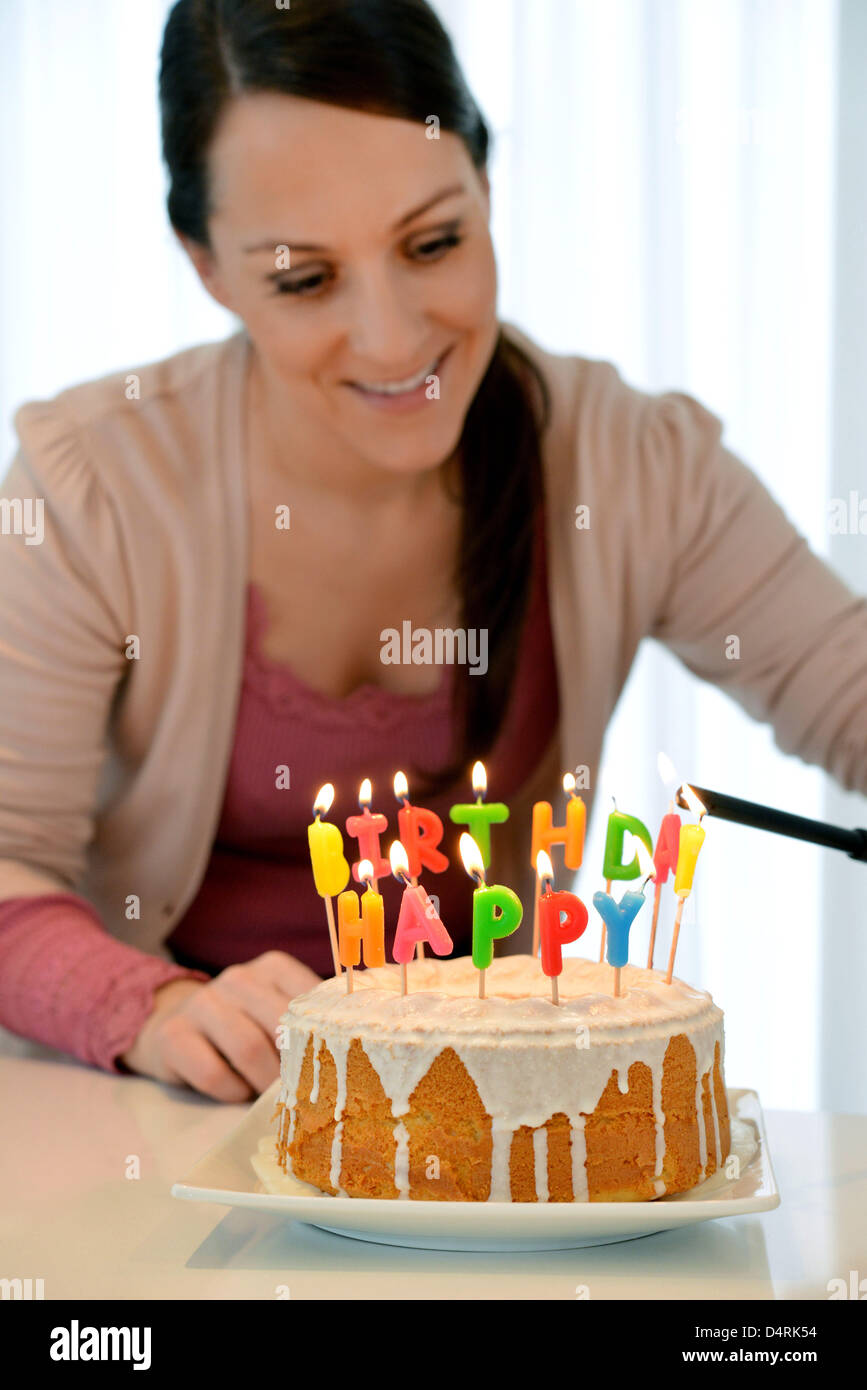 A birthday cake with candles Stock Photo - Alamy