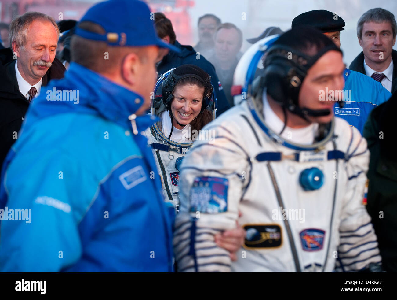 Expedition 23 crew, including Aleksandr Skvortsov and Tracy Caldwell ...