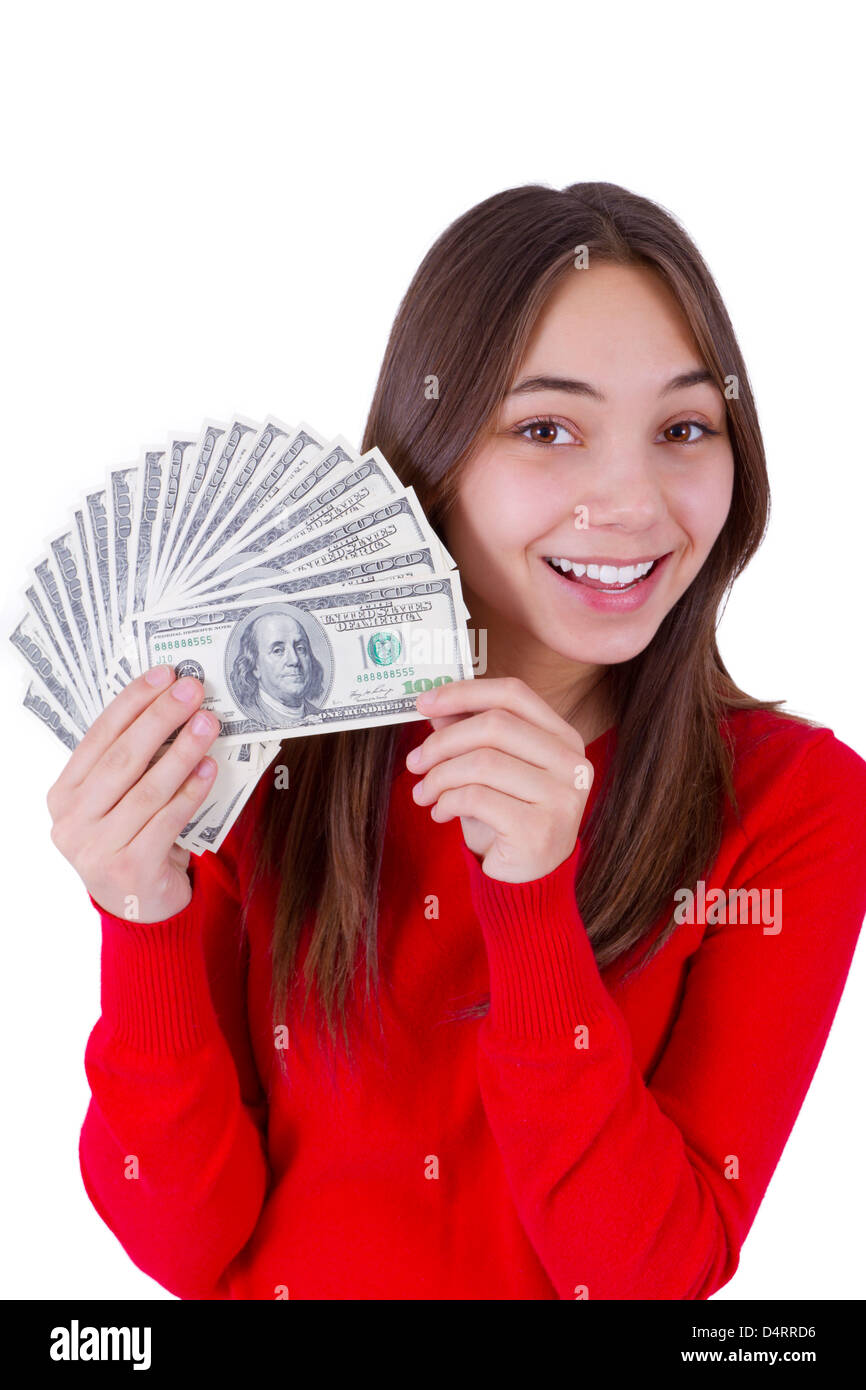 Young girl holding her paycheck, I guess time to spend all in once, all one hundred dollar banknotes. Isolated on white. Stock Photo