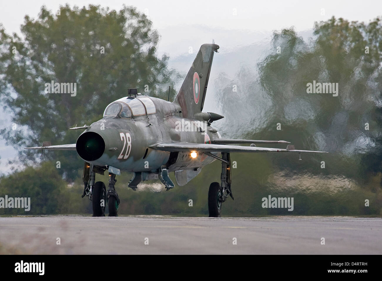 A Bulgarian Air Force MiG-21UM aircraft taxiing after a training sortie at Graf Ignatievo Air Base, Bulgaria. Stock Photo