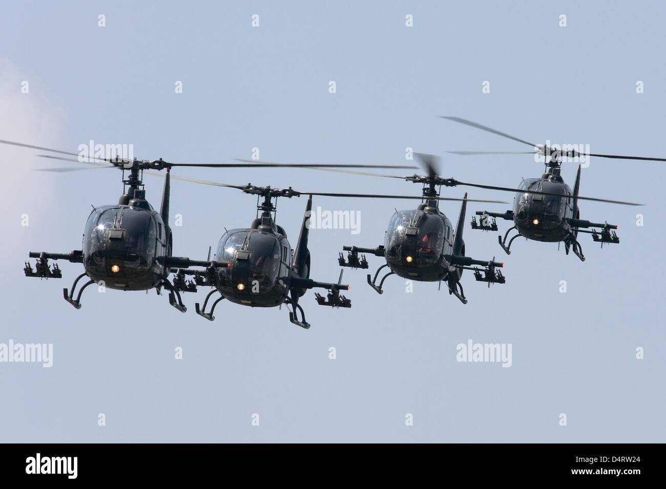 Serbian Air Force Soko SA-342L GAMA choppers in flight over Kraljevo, Serbia. Stock Photo