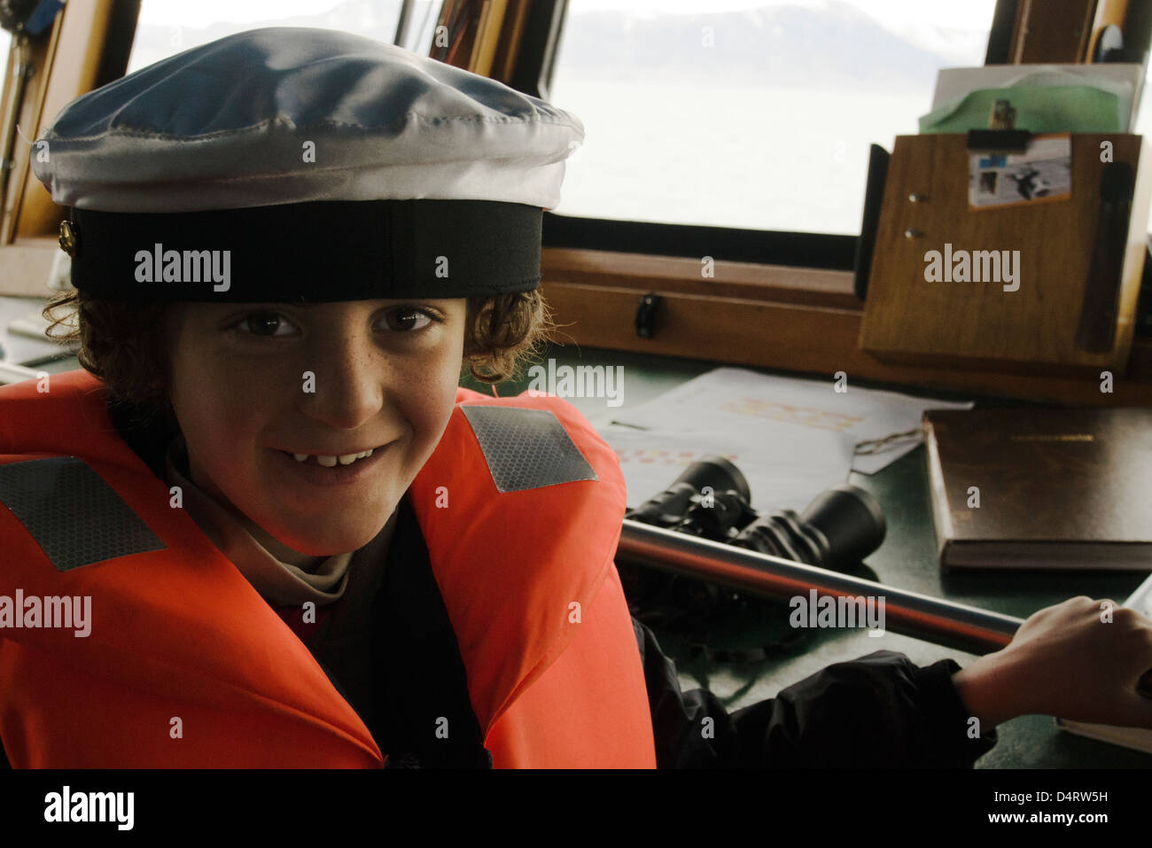 Boy playing captain, cockpit Stock Photo - Alamy