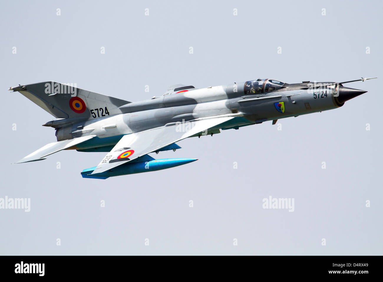 A Romanian Air Force MiG-21 MF LanceR-C performs at the Bucharest International Air Show 2012, Romania. Stock Photo