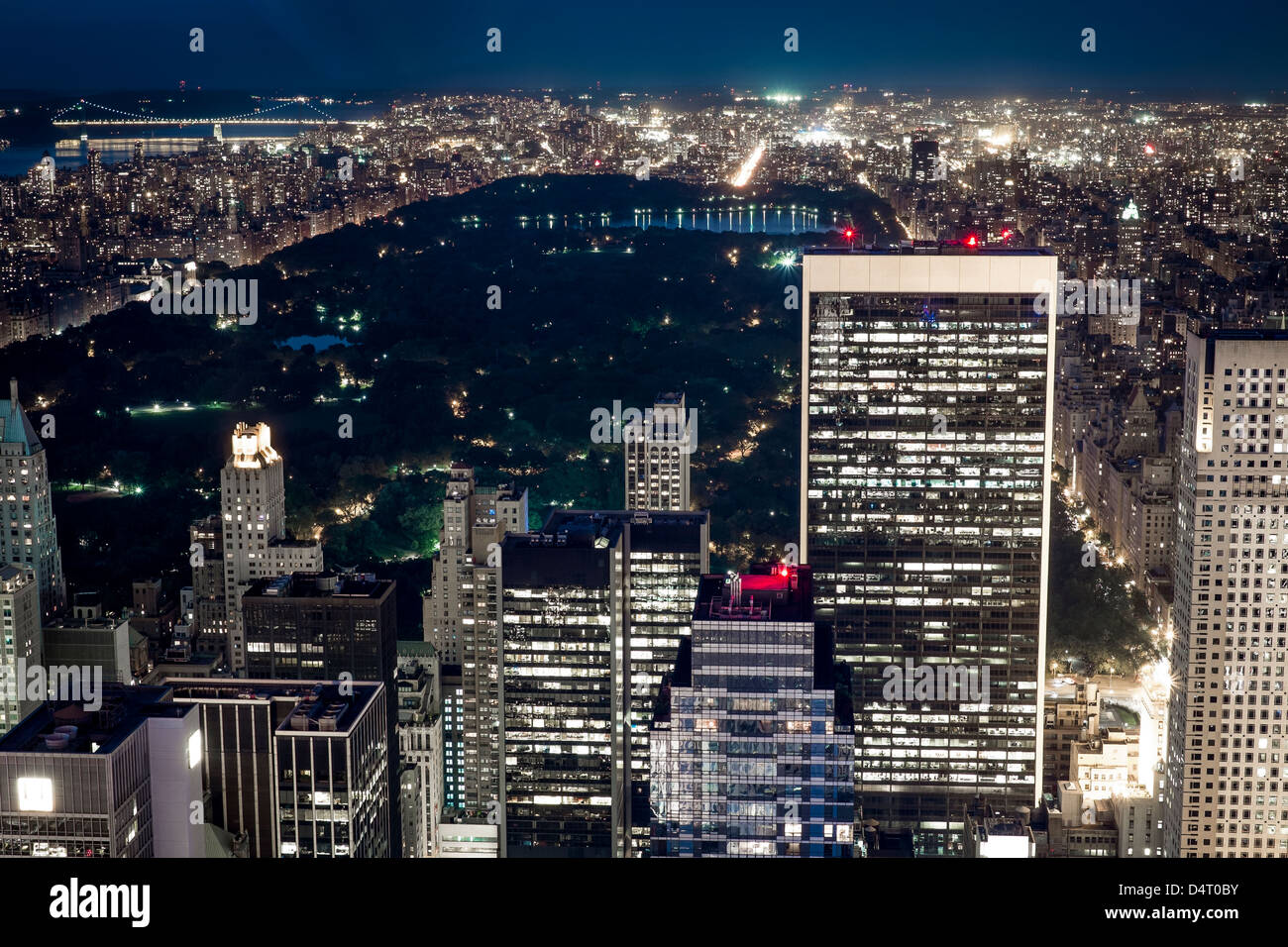 New York Manhattan skyline at night viewed from Rockefeller Center. Central Park view. Stock Photo