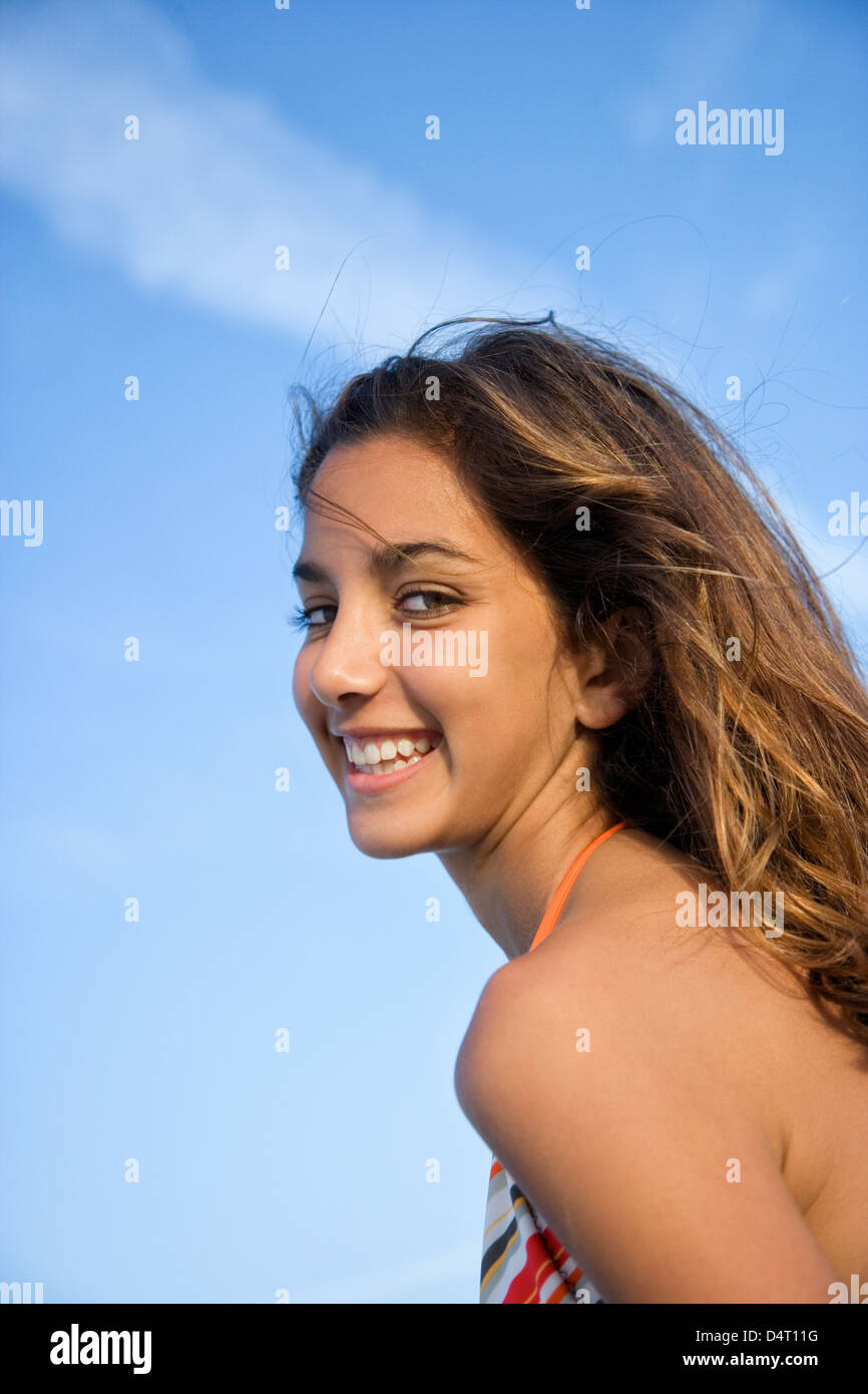 Portrait Of Teenage Girl Wearing Bikini On Beach Stock