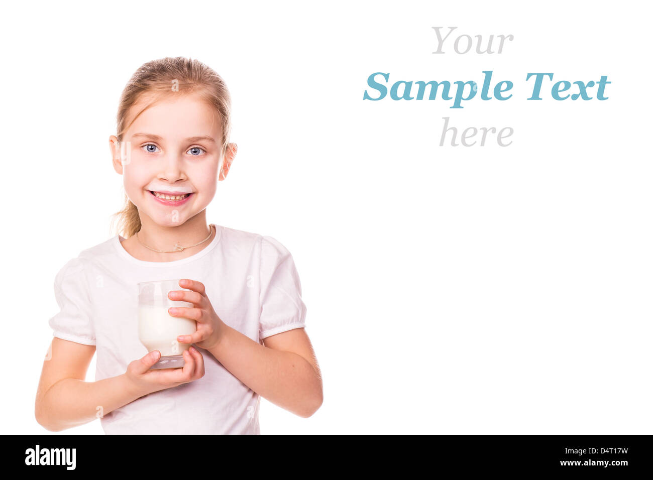 Beautiful little girl holding a glass of fresh milk isolated on white Stock Photo