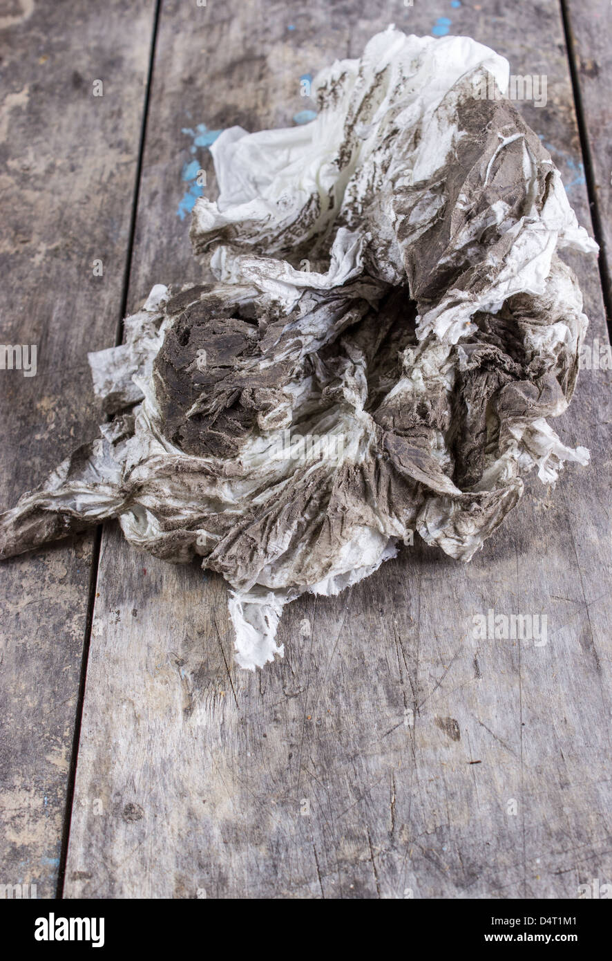 Old dirty torn rag isolated on white background. Cleaning rag Stock Photo -  Alamy