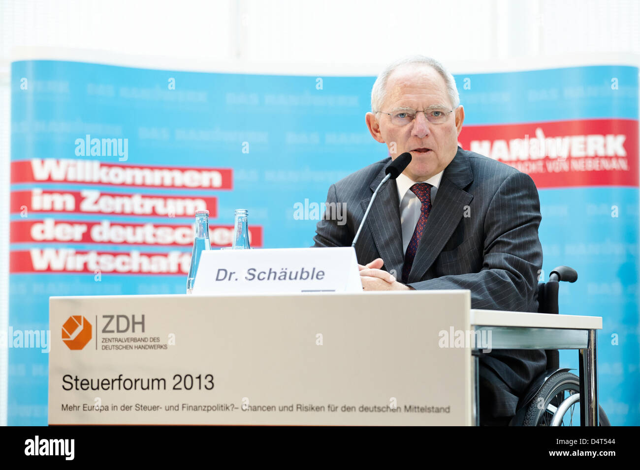Wolfgang Schaeuble (CDU), Federal Minister of Finance, speaks at the ZDH-Tax Forum 2013 in Berlin./ Berlin, 18 March 2013. Representatives of the Federal Government, the German Parliament, the European Commission and the courts discuss the challenges of fiscal policy in Europe and the focus of tax policy in the 18th Discuss legislative session at The German Confederation of Skilled Crafts ZDH-Tax Forum 2013 on 'More Europe in the tax and fiscal policy?' The speakers are Wolfgang Schaeuble, Federal Minister of Finance, Heinz Zourek, Director General for Taxation and Customs Union of the Europea Stock Photo
