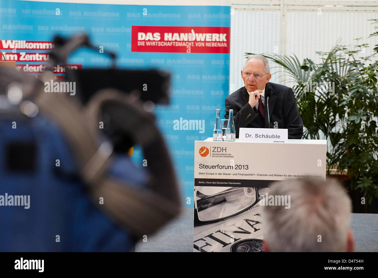 Wolfgang Schaeuble (CDU), Federal Minister of Finance, pictured at  the ZDH-Tax Forum 2013 in Berlin. / Berlin, 18 March 2013. Representatives of the Federal Government, the German Parliament, the European Commission and the courts discuss the challenges of fiscal policy in Europe and the focus of tax policy in the 18th Discuss legislative session at The German Confederation of Skilled Crafts ZDH-Tax Forum 2013 on 'More Europe in the tax and fiscal policy?' The speakers are Wolfgang Schaeuble, Federal Minister of Finance, Heinz Zourek, Director General for Taxation and Customs Union of the Eur Stock Photo