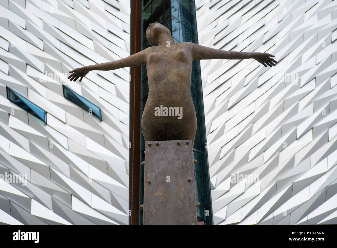 Rowan Gillespie's sculpture Titanica in front of the Titanic museum in Belfast. Stock Photo