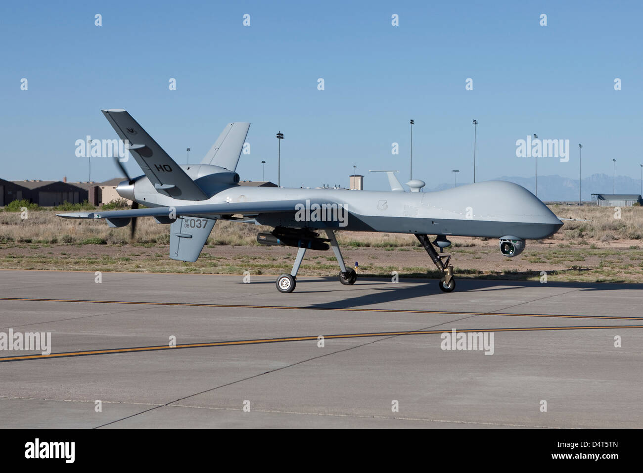 An MQ-9 Reaper taxi's to the runway at Holloman Air Force Base, New Mexico. Stock Photo