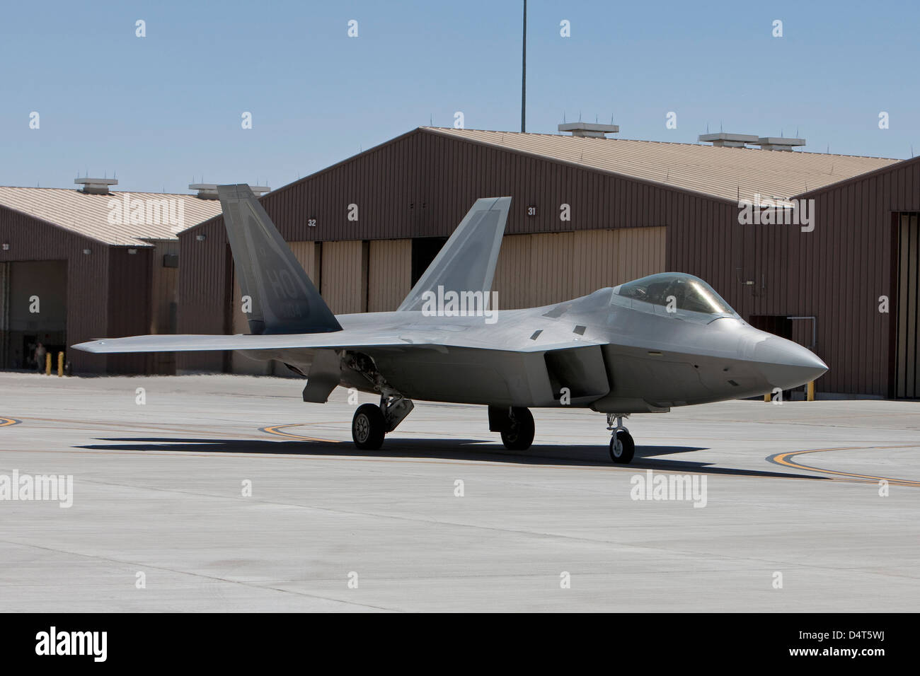 An F-22 Raptor taxi's to the runway for a training mission out of Holloman Air Force Base, New Mexico. Stock Photo