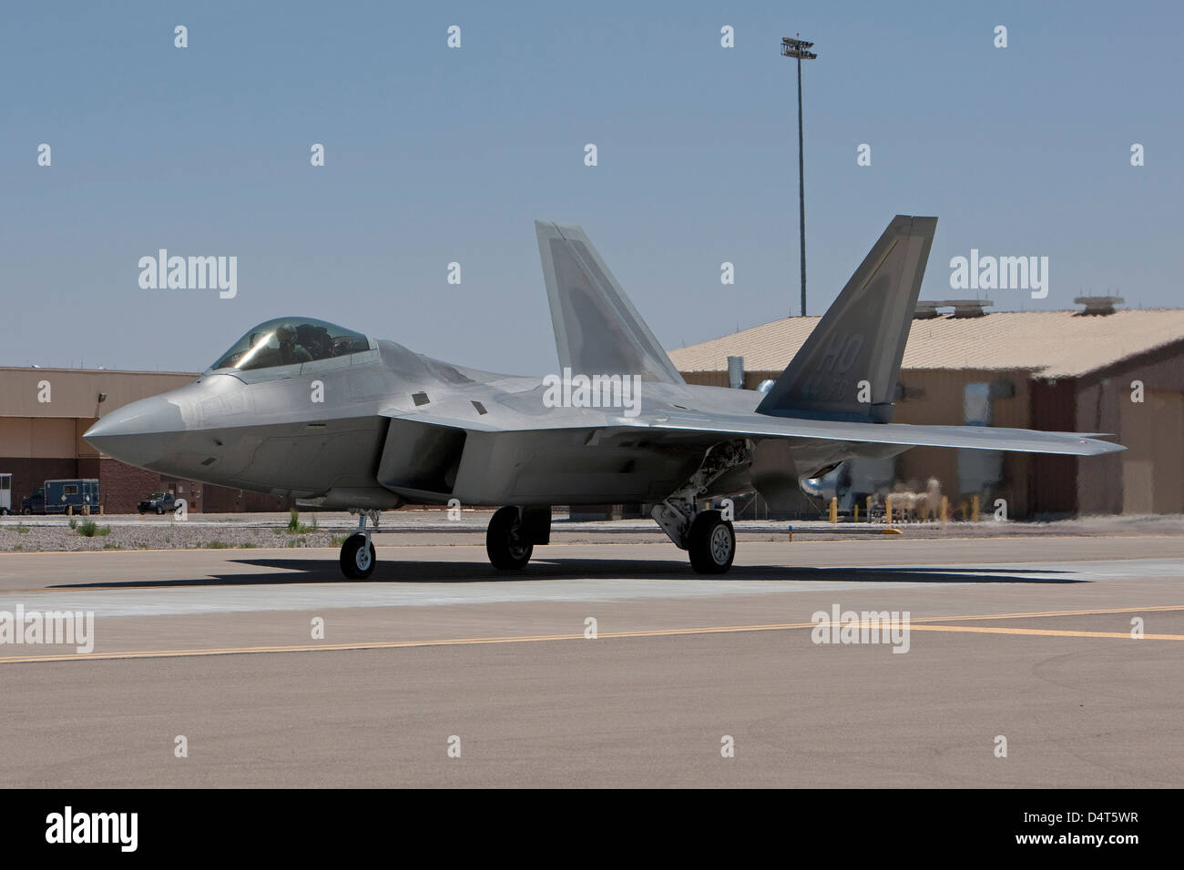 An F-22 Raptor taxi's to the runway for a training mission out of Holloman Air Force Base, New Mexico. Stock Photo