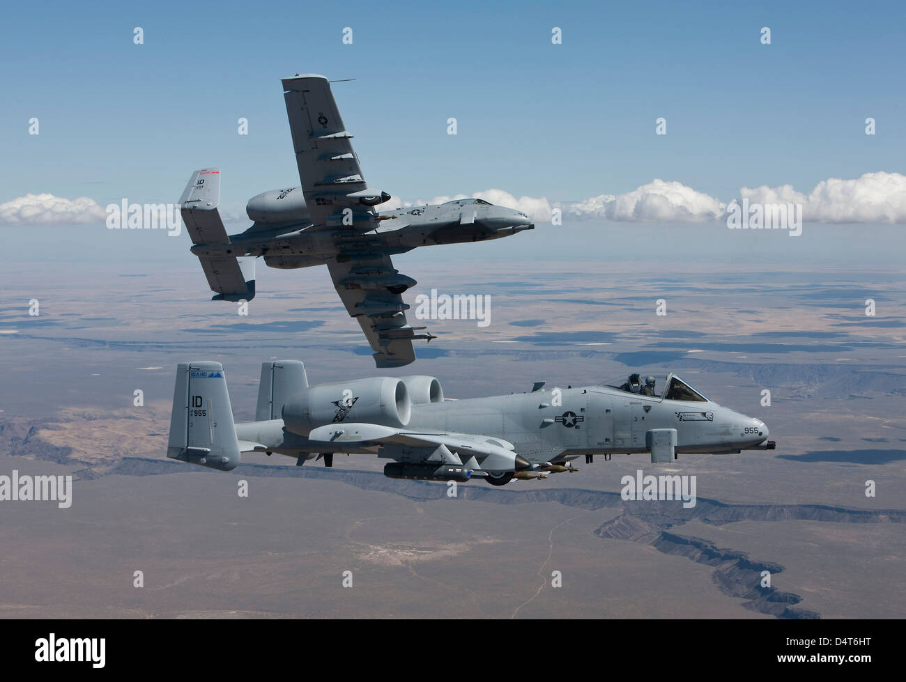 Two A-10 Thunderbolt's from the 124th Fighter Wing manuever while flying over the Saylor Creek bombing range in Central Idaho. Stock Photo