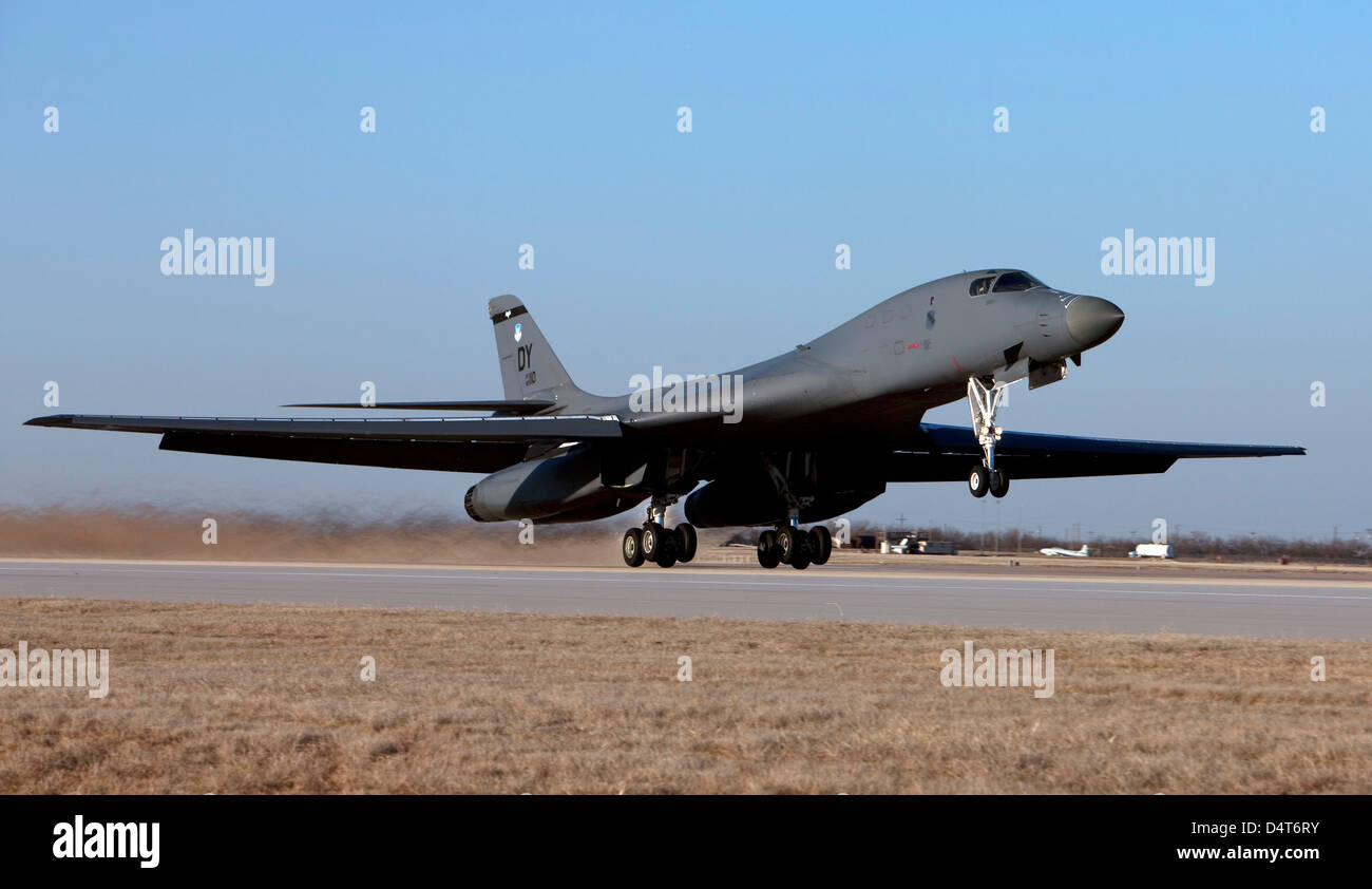 A 7th Bomb Wing B-1B Lancer takes off in the late afternoon from Dyess Air Force Base, Texas. Stock Photo
