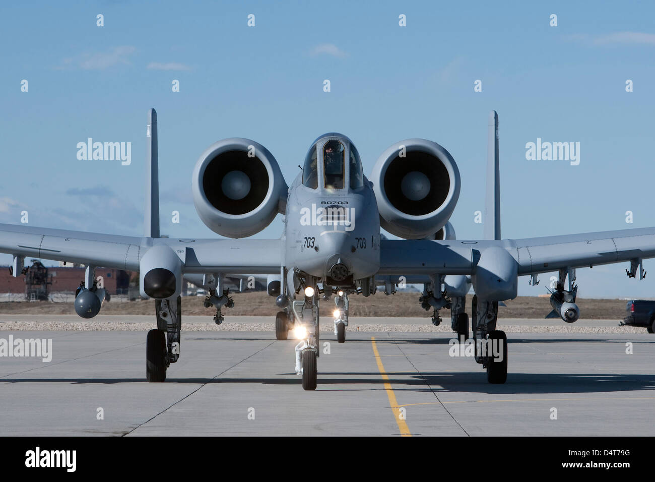 Two A-10 Thunderbolt's from the 190th Fighter Squadron taxi to the runway on a training mission out of Boise, Idaho. Stock Photo