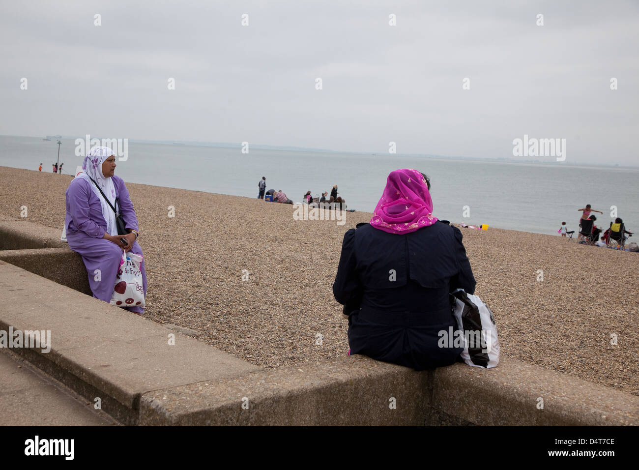 Southend, UK, migrants on the beach Stock Photo