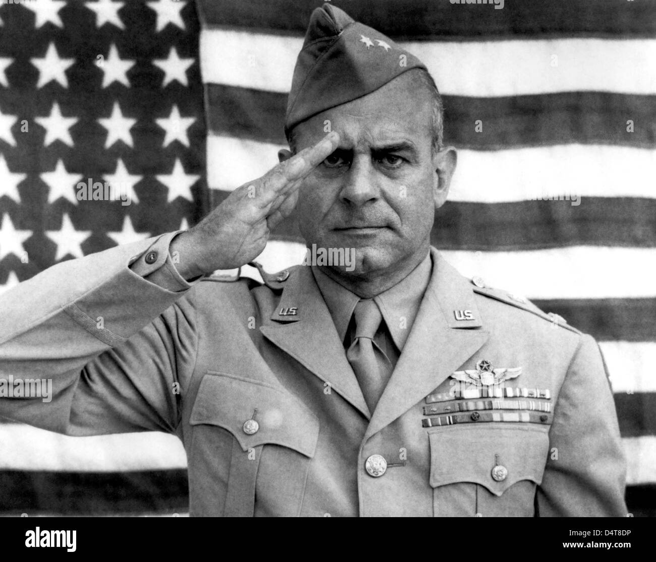 General James Jimmy Doolittle saluting with The American Flag. Stock Photo